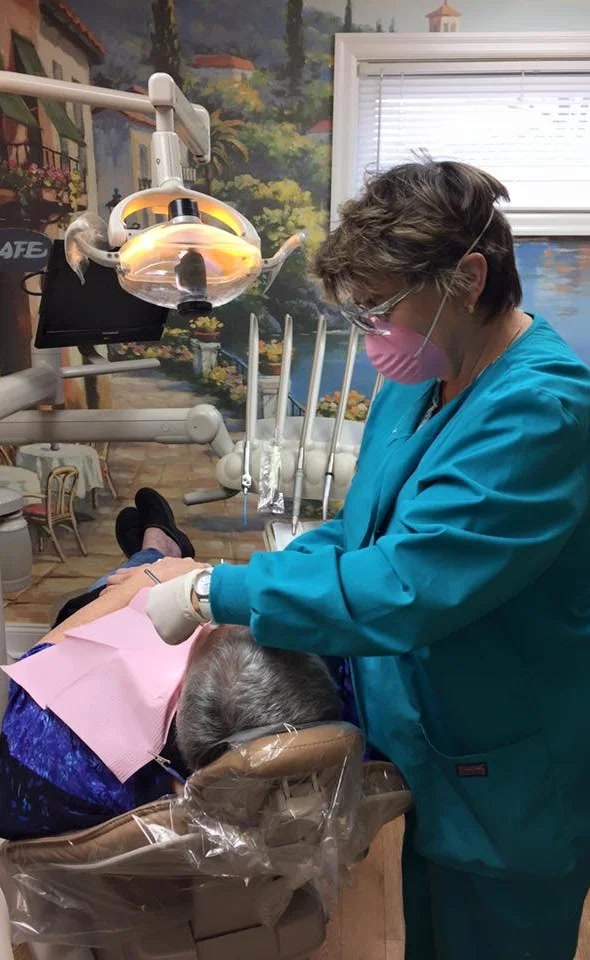Dr. Marcin providing specialized dental care to a patient